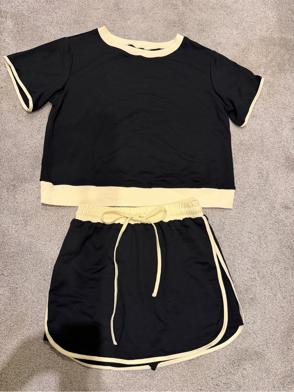 Ladies black and cream skirt set